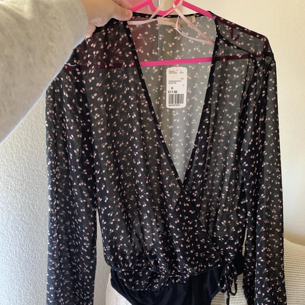 Floral bodysuit size medium new with tags